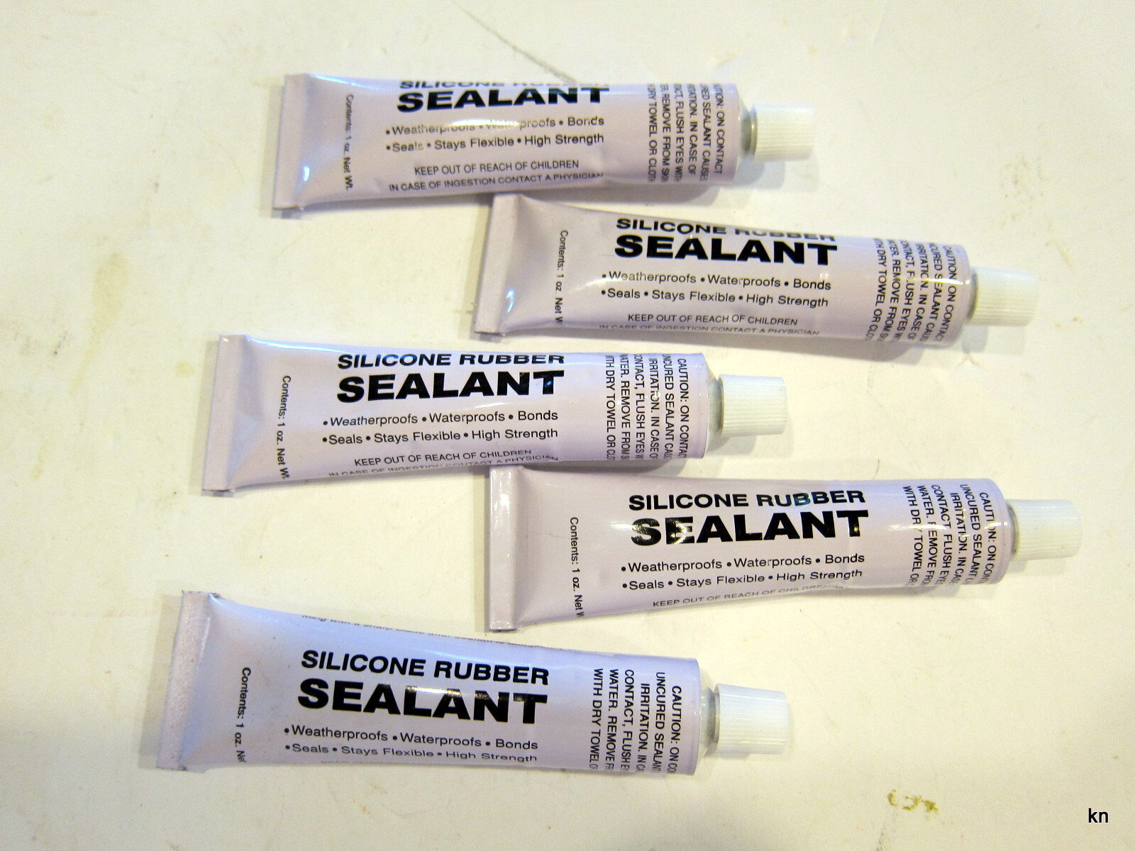 Five 1 ounce Silicon Rubber Sealant. Use on Kirby vacuum fan case. Many