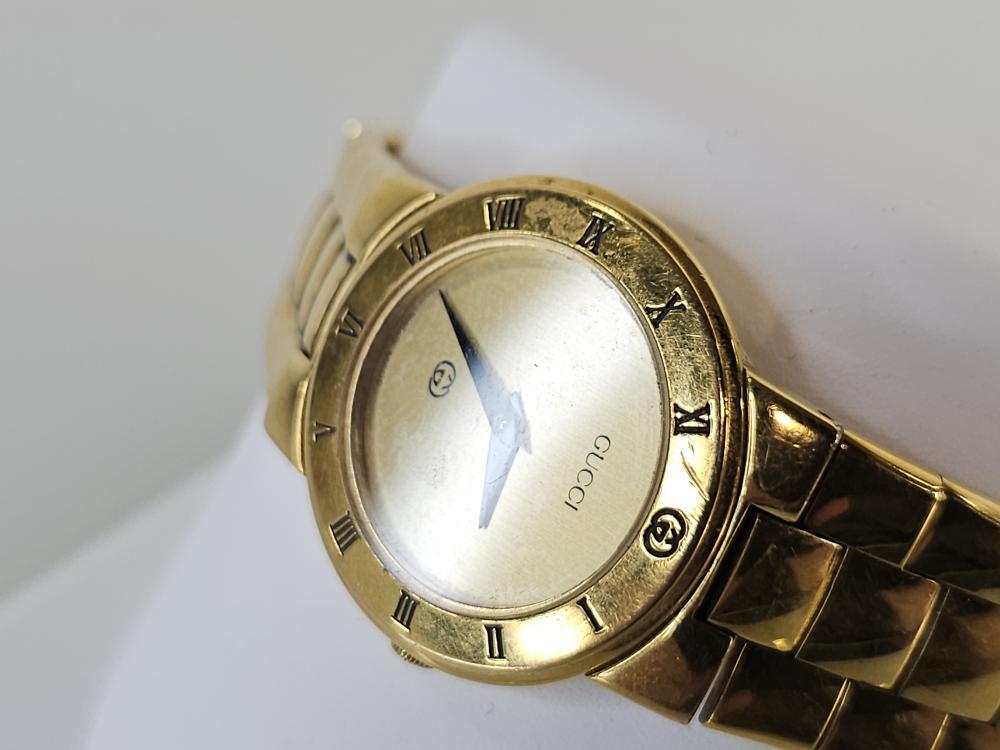 183-5☆美品☆ GUCCI 3300L ゴールド レディース 腕時計 黒文 GUCCI グッチ レディース腕時計 クォーツ 3300L ゴールドメッキ