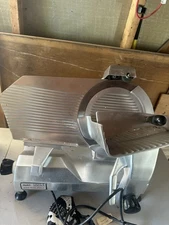 Commercial Grade Slicers Sold Separately One Is Automatic. The Other One Not