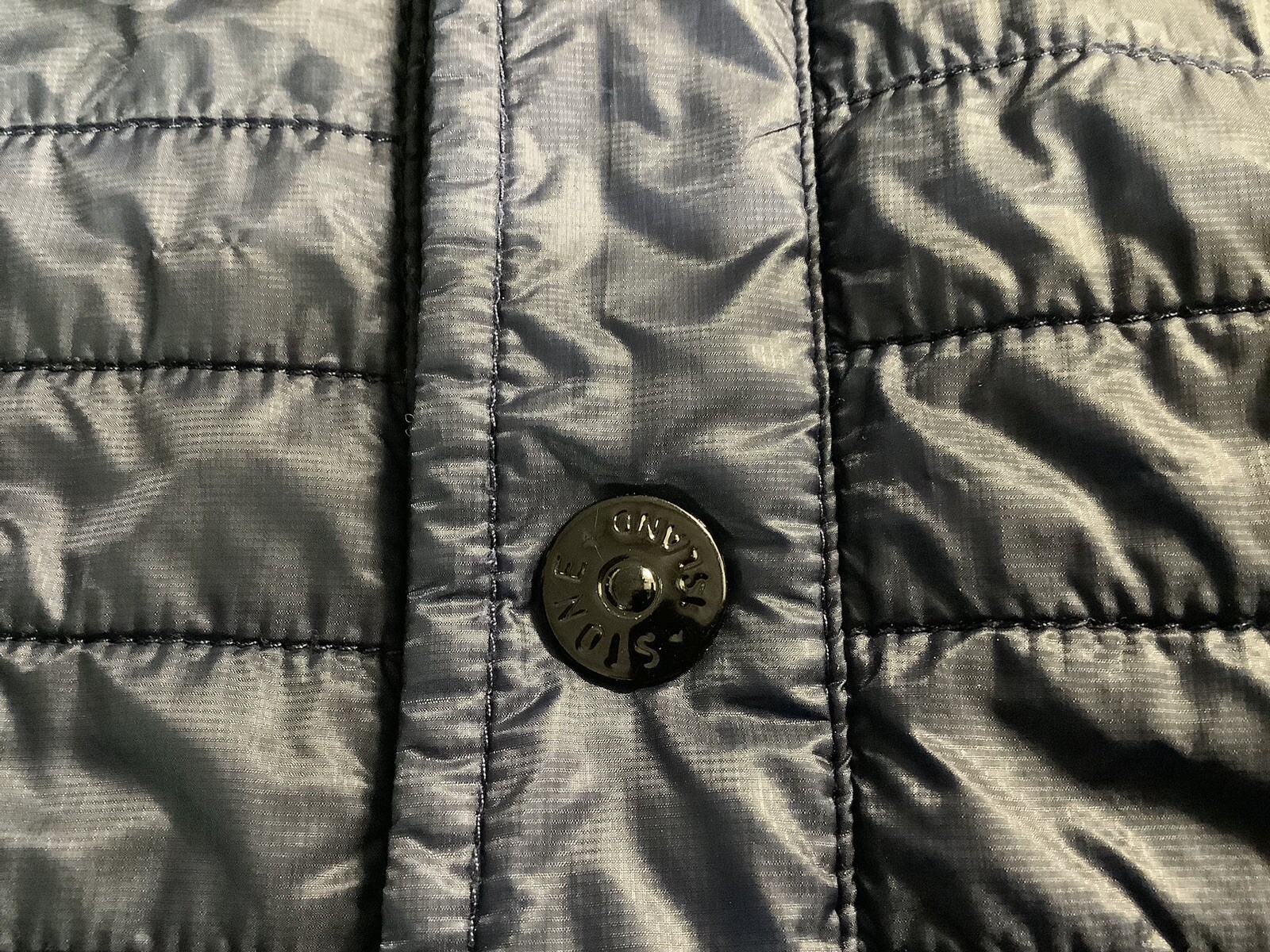 Stone island micro rip stop 7 den quilted lightweight puffer