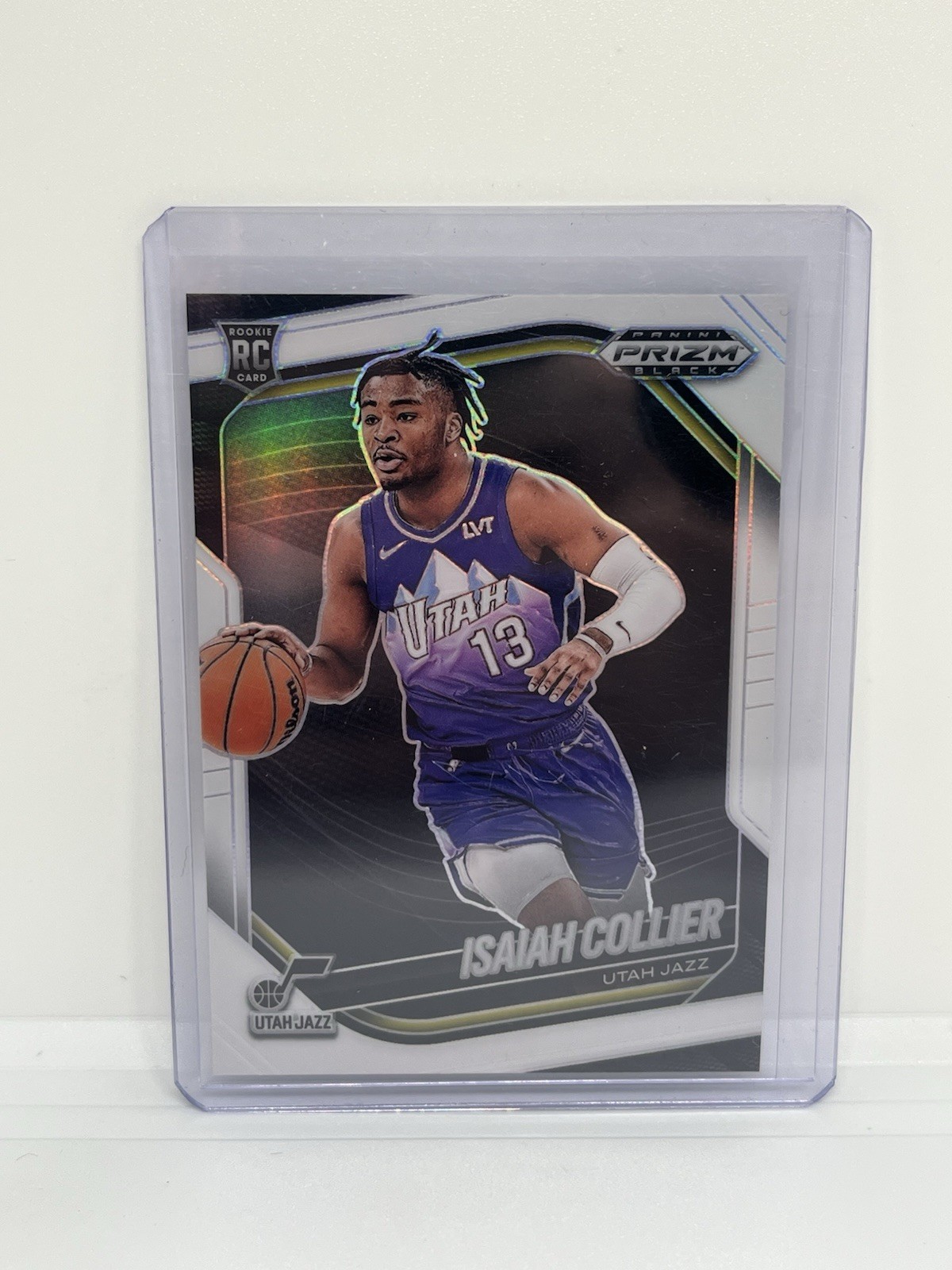 2024-25 Panini Prizm Black - #32 Isaiah Collier White /175 RC