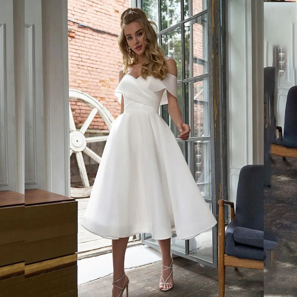 audrey smocked midi dress product info and reviews The Audrey Dress