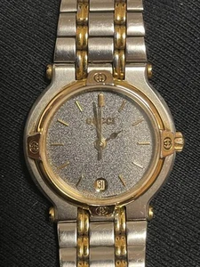 Montre femme GUCCI 9000L cadran noir boîtier argent et or Quortz occasion du Japon