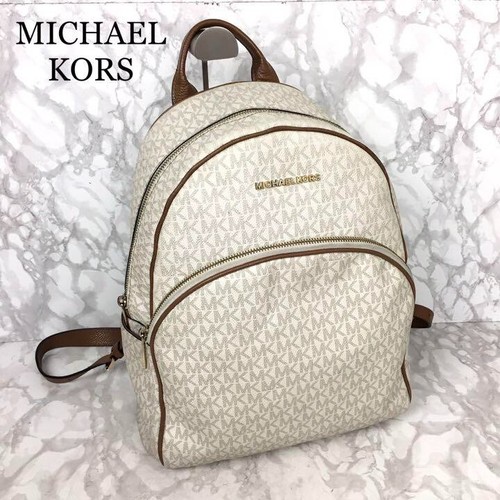 Arriba 53+ imagen michael kors backpack white and brown Abzlocal.mx