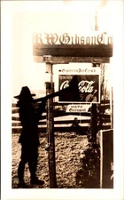 RPPC Man Signpost Coca-Cola 5 Cent Advertising Storefront Greenwood