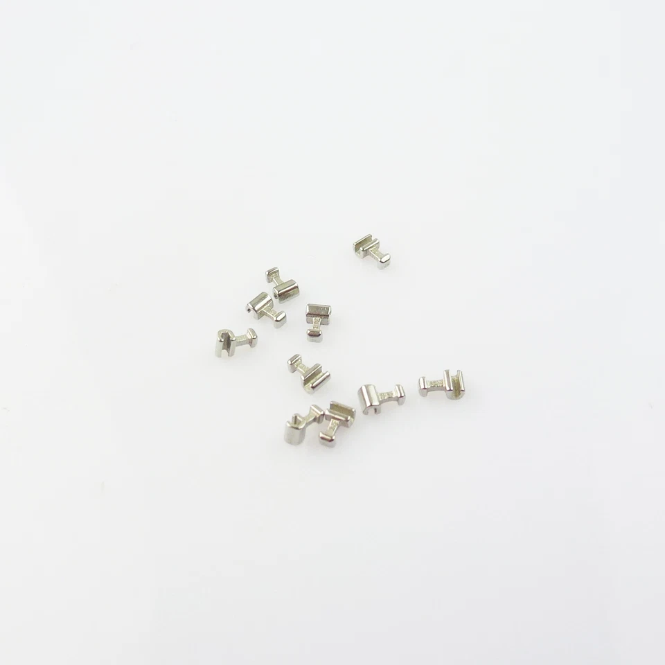 10 piezas Paradas dentales Ortodoncia Ganchos Prensables Cortos/Largos/Izquierdos Tubos Cruzados Brackets Foto 4 de 4