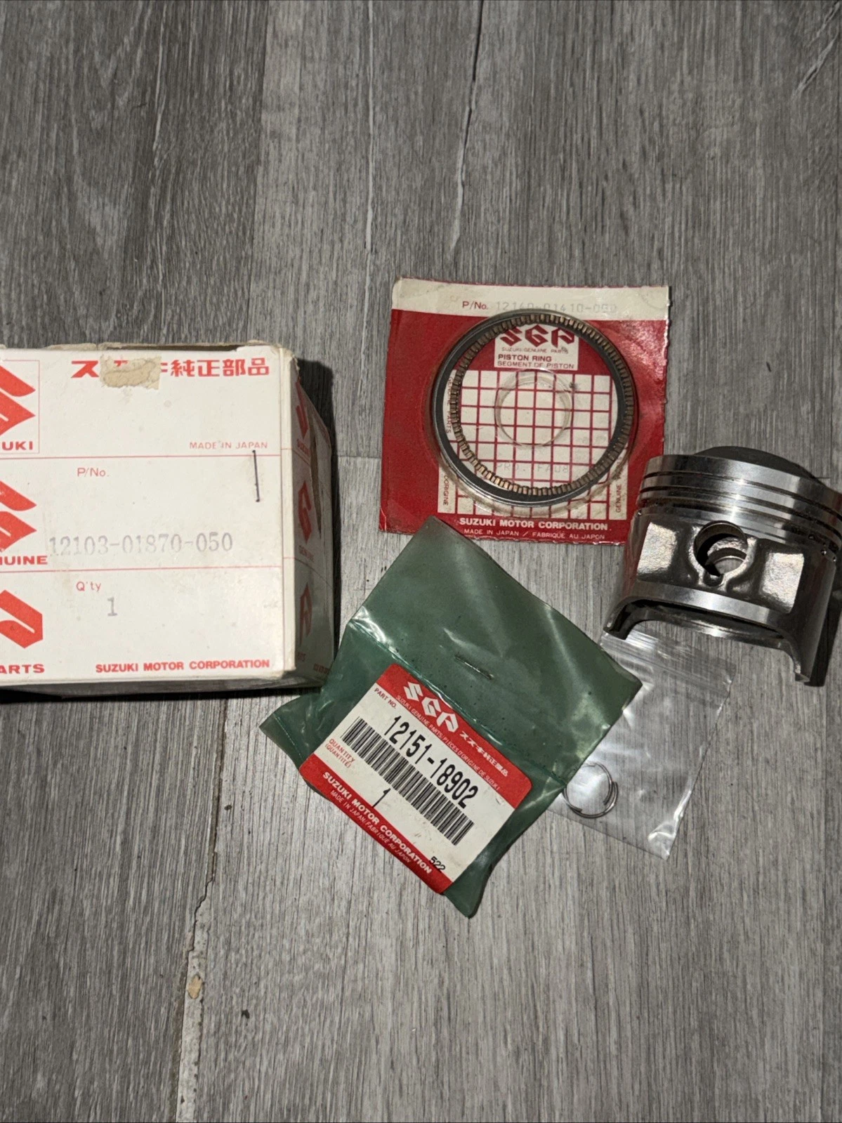 NOS Suzuki OEM Piston KIT OVERSIZED 0.5mm 1983-1987 LT125 ALT125