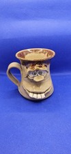 Ugly Face Studio Pottery Mug.