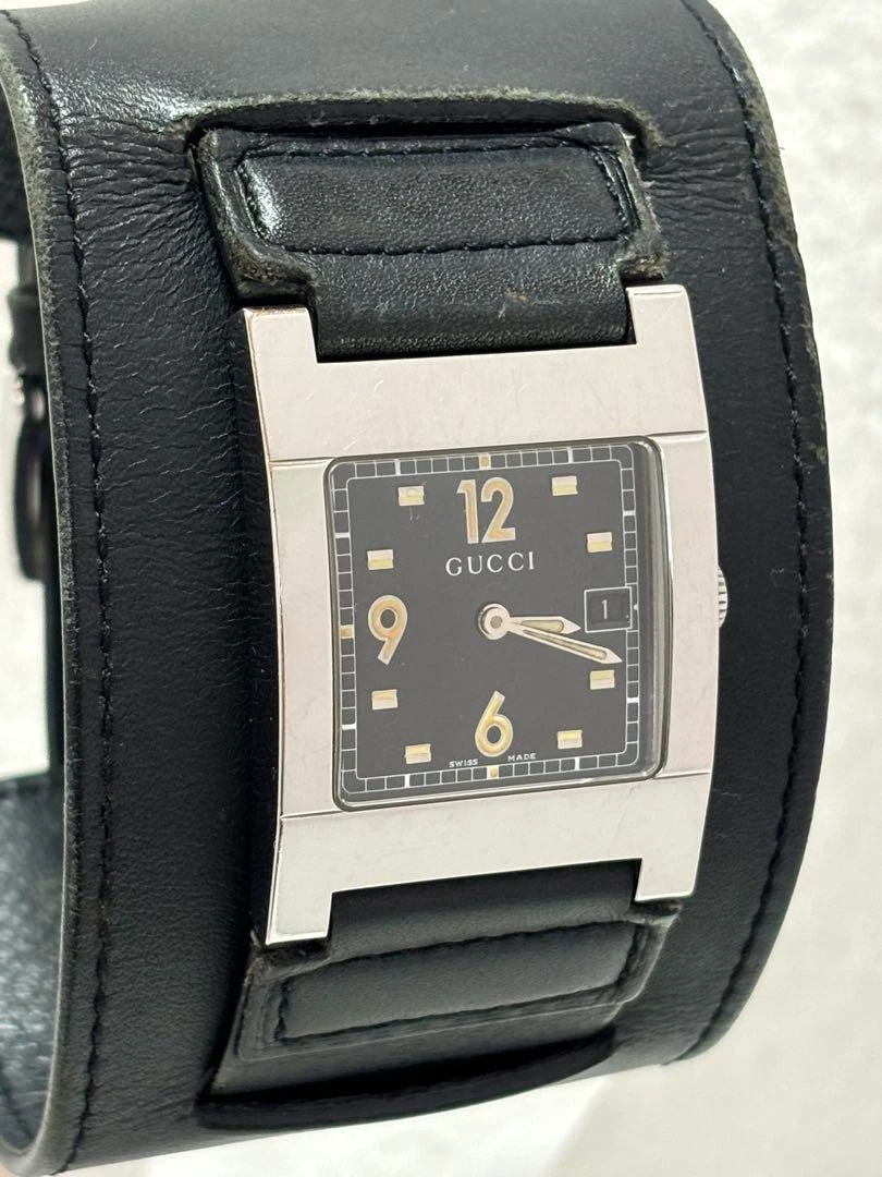 Montre homme Gucci 7700M Swiss Made cadran noir occasion fonctionne bracelet authentique