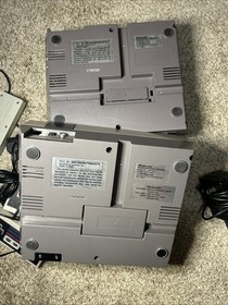FOR PARTS  2 NES NINTENDO consoles + Cords controllers Games *Powers On* READ