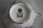 Vintage Paragon Fine Bone China Floral Design Footed Teacup and Saucer — photo 9