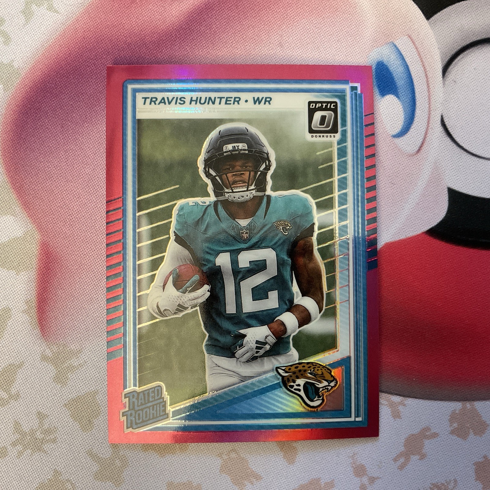 2025 Donruss Optic Football #201 Travis Hunter Pink Holo Rated Rookie Jaguars