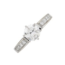 A 14k white gold natural diamond engagement ring