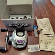 Mulinello da baitcasting SHIMANO BASS ONE XT. Controlla le condizioni nella f...