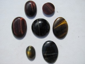 Fantastic Lot (7) RED,GOLDEN,BLUE TIGEREYE cabs 33.1 grams or 165.5 cts