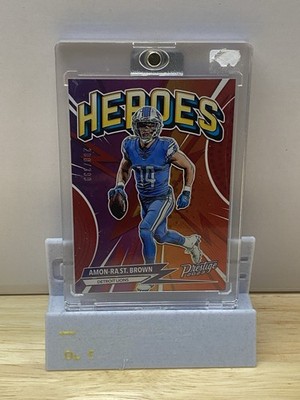 2023 Panini Prestige - Heroes Amon-Ra St. Brown #H-15 Xtra Points Red /399