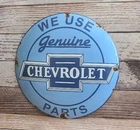 Vintage WE USE GENUINE CHEVROLET PARTS Porcelain Metal Domed Chevy Sign