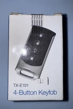 Brand New Interlogix TX-E101 Four Button Chrome Wireless Keyfob LED confirmation
