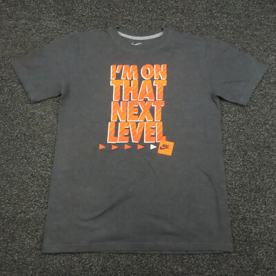 grey and orange nike shirt