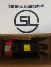 FANUC SERVO MOTOR, A06B-0501-B005 7076. NEVER INSTALLED, BUT SHOWS SHELF WEAR.