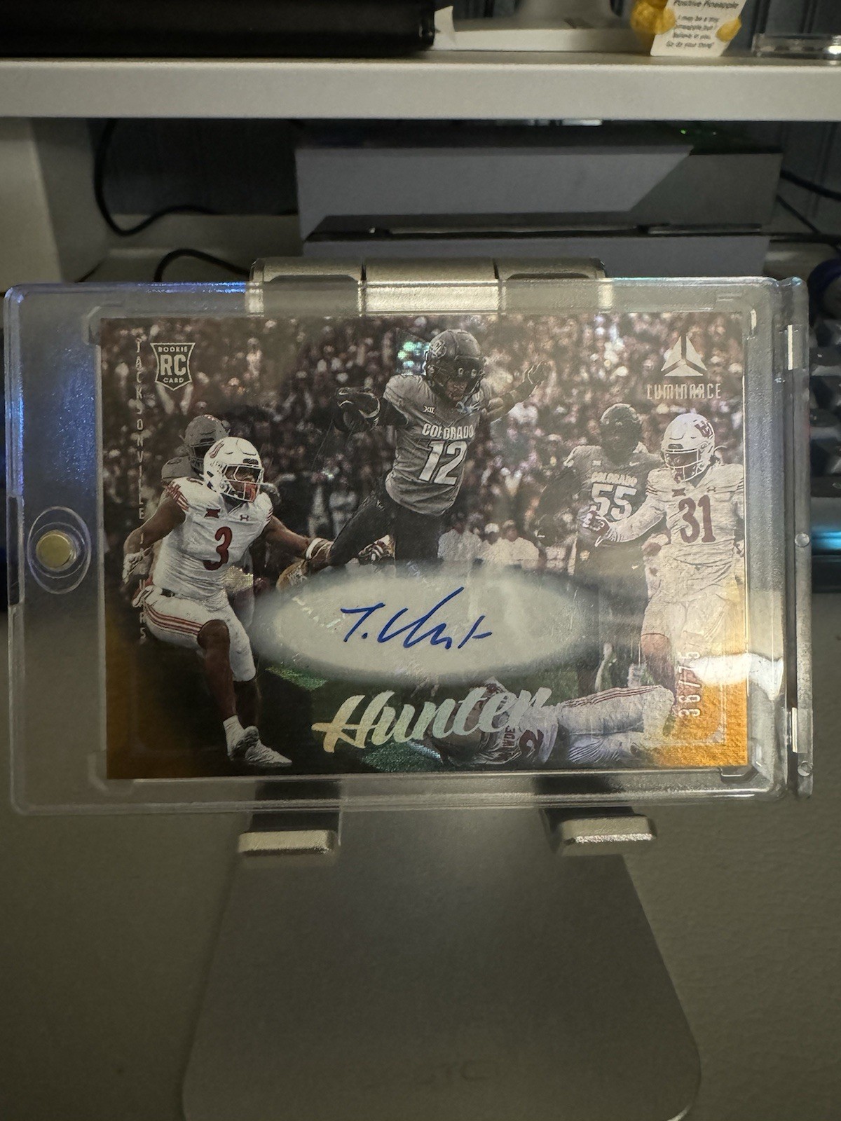 2025 Panini Luminance - Rookies Travis Hunter #190 Gold Autographs /75 (AU, RC)
