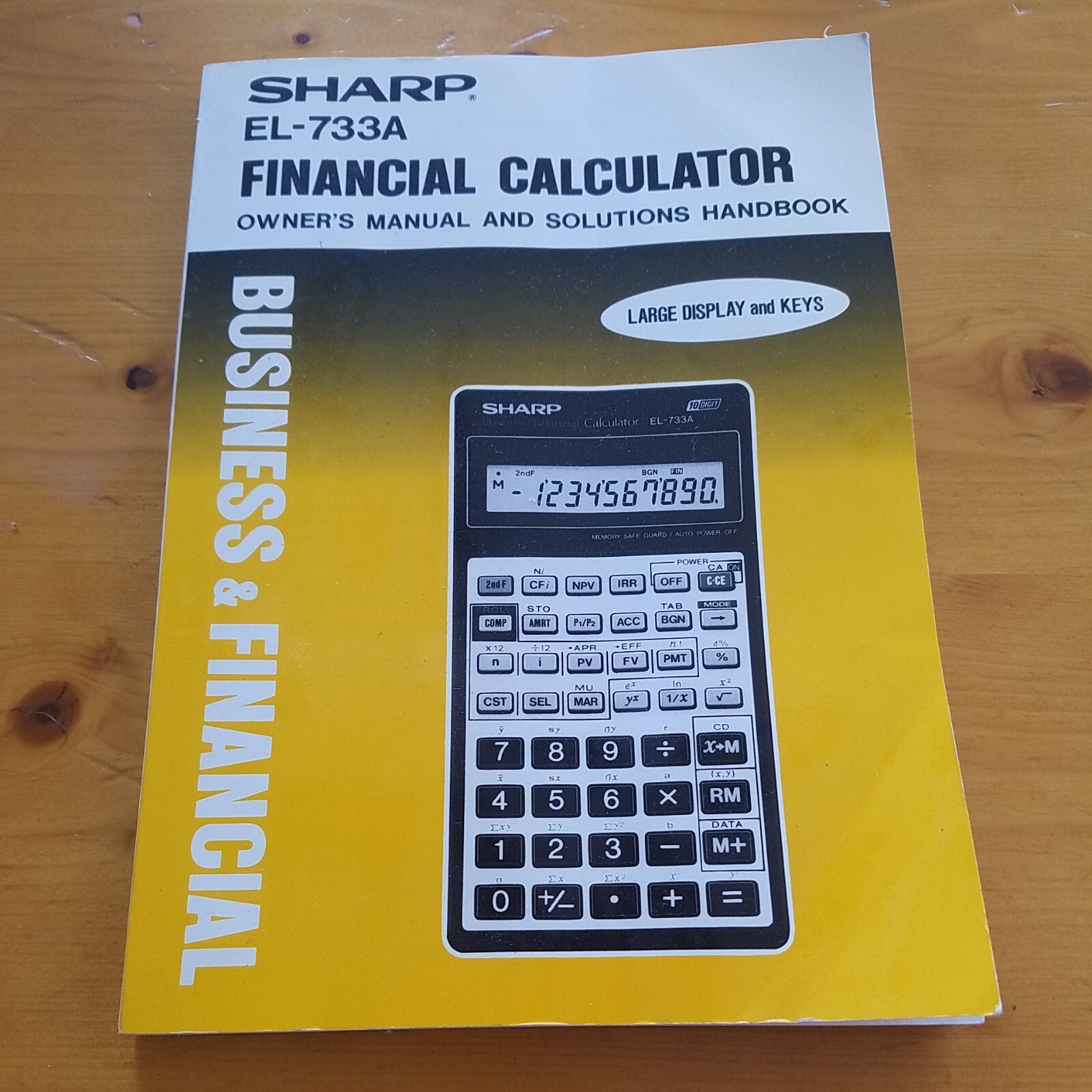 Sharp EL733A Financial Calculator Owner’s Manual and Solutions