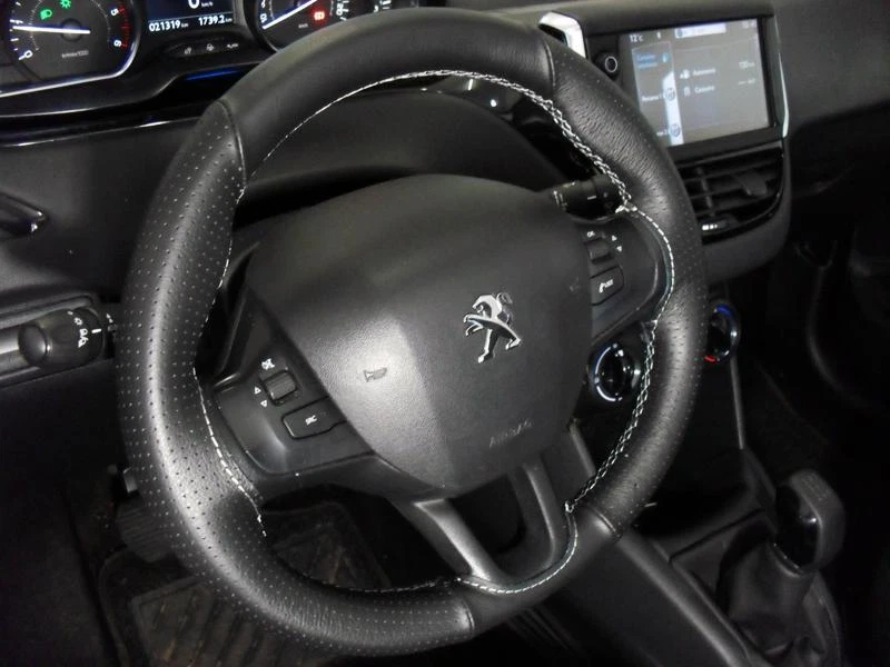 COPRIVOLANTE su misura PEUGEOT 207 VERA PELLE NERA traforata CUCITURE ROSSE