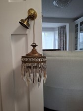 Brass chandelier crystals glass drops used. at least 55 years old