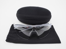 Oakley Sphaera Clear to Black Iridium Photochromic Lens Matte Clear Frame