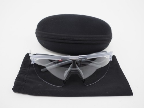 Oakley Sphaera Clear to Black Iridium Photochromic Lens Matte Clear Frame