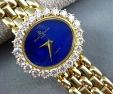 ESTATE LARGE BAUME & MERCIER 3.36CT DIAMOND & LAPIS 18KT YELLOW GOLD OVAL WATCH