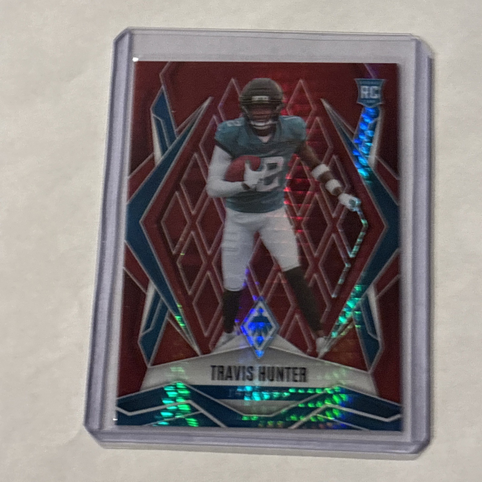 2025 Panini Phoenix - Rookies Travis Hunter #157 Red Hyper /399 (RC)
