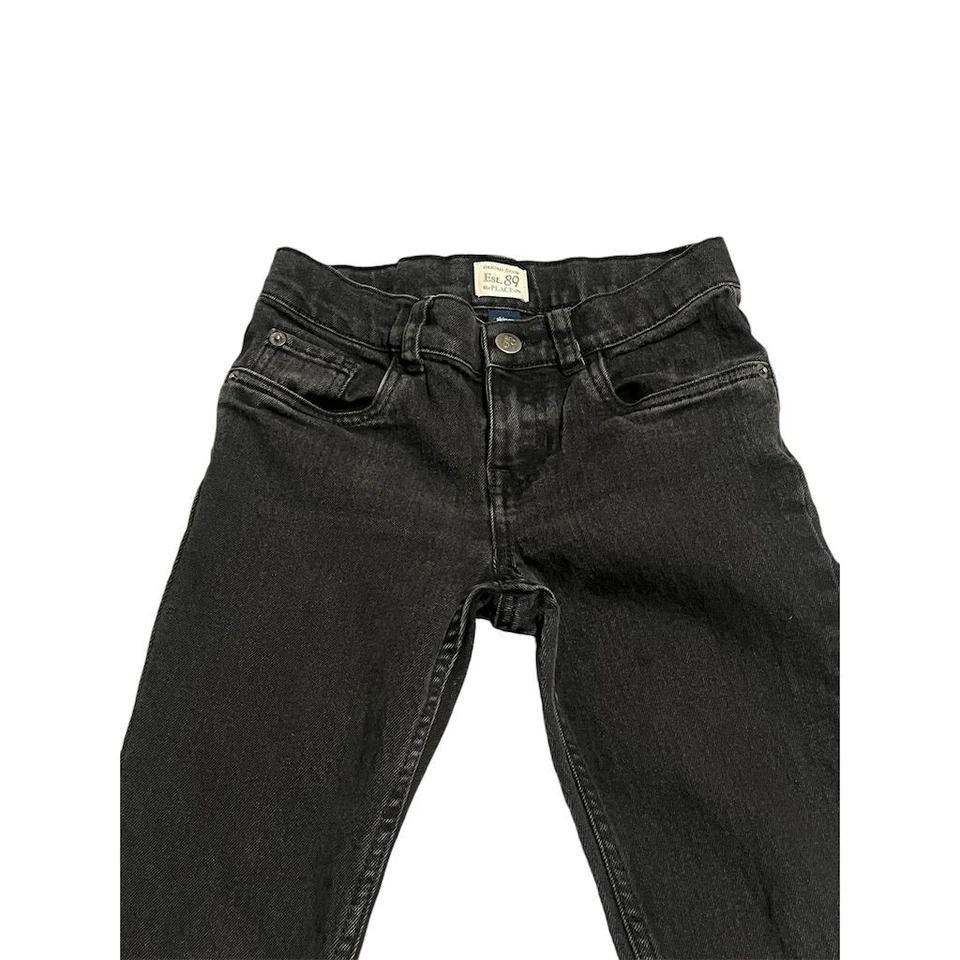 Pantalones de mezclilla elásticos ajustados negros talla 10 The Children's Place para niñas Foto 2 de 4