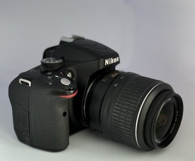 Nikon D5100 DSLR Camera w/ 18-55mm VR Lens, Battery, Charger & Vanguard Bag