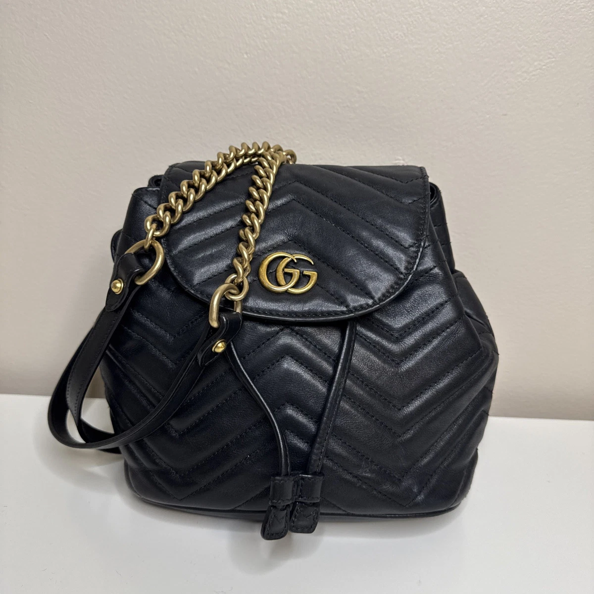 gucci black mini gg marmont 2.0 backpack 191451f042002 Matelasse Leather Crossbody Bag 474575 For a sleek day edit GG Marmont small camera bag