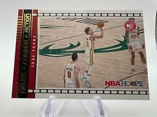 2021-22 Panini NBA Hoops Trae Young Lights Camera Action #2 Green Ice Hawks