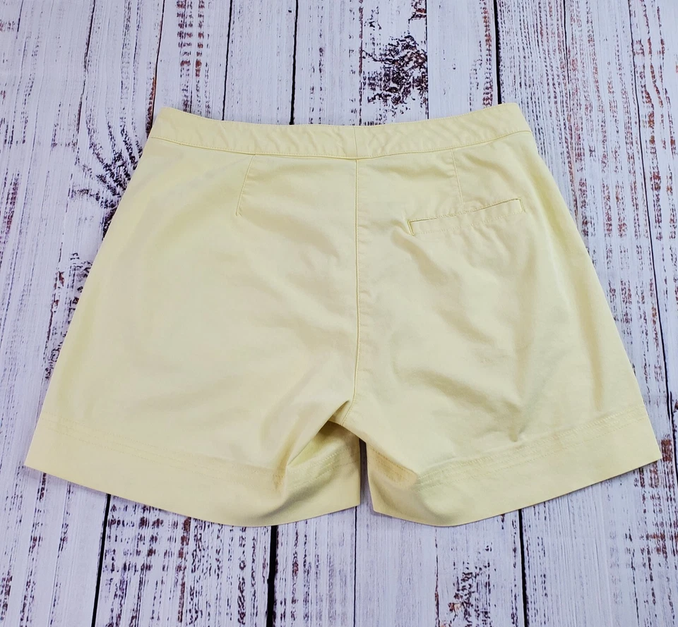 Pantalones Cortos de Golf Nike Para Mujer S 6 Amarillo Frente Plano Dri-Fit Bolsillos con Cremallera Básicos 4.5 pulgadas Foto 2 de 4