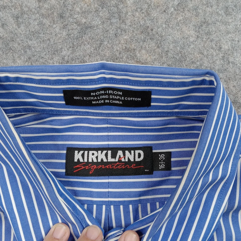 Camisa de vestir Kirkland Signature para hombre 16,5 36 rayas azules sin planchar con botones Foto 2 de 4