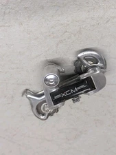 SUNTOUR XCM XC-MASTER ACCUSHIFT MOUNTAIN BICYCLE REAR DERAILLEUR For parts only