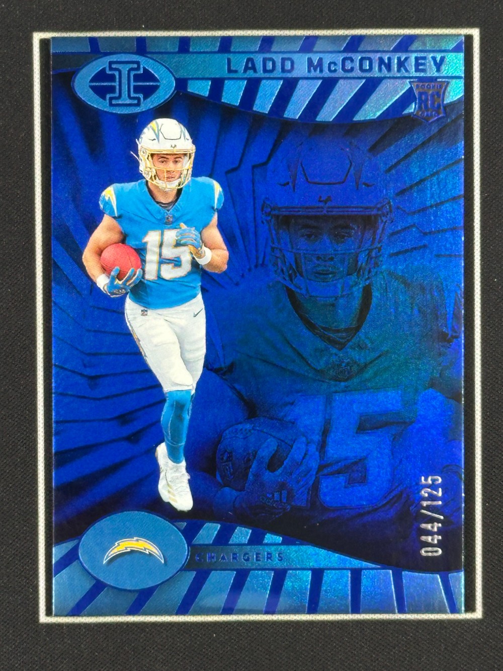 2024 Panini Illusions Blue Trophy Rookie RC #51 Ladd McConkey 44/125 HD