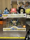Funko Pop! Moments: One Piece - Monkey D. Luffy Trains Kung Fu Dugong - Box Dmg