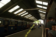 Photo 12x8 View of the platform at New Romney station from a train carriag c2016