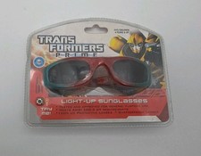 TRANSFORMERS PRIME 2012 OPTIMUS PRIME LIGHT UP SUNGLASSES KIDS Red Blue NIB