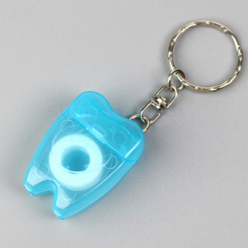 5x Mini llavero dental tipo hilo dental limpieza de dientes selección 15 m colores aleatorios Foto 2 de 4