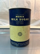Vtg 1-pound paper tin features Merck Milk Sug...