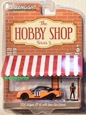 GREENLIGHT 2018 HOBBY SHOP SERIES 3 2011 NISSAN GT-R WITH RACE CAR DRIVER
