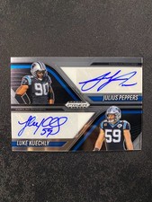 2025 Panini Prizm Dual Auto Luke Kuechly Julius Peppers #DA-CAR E619