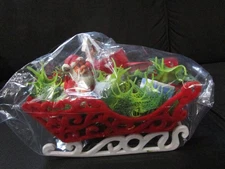 Vintage soft plastic centerpiece Christmas Santa Claus in sleigh so tacky!