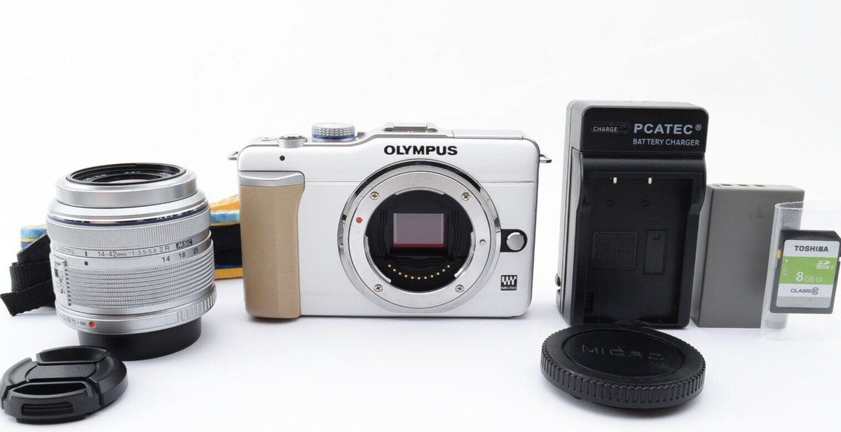 Olympus Pen E-PL1 White 12.3MP 14-42mm II Lens set Olympus Pen E-PL1 White 12.3MP 14-42mm II Lens set
