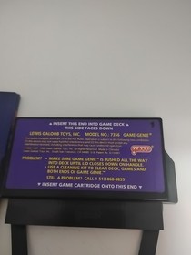 Nintendo NES Game Genie Game Enhancer Model 7356 w/ Cheat Codes Manual 